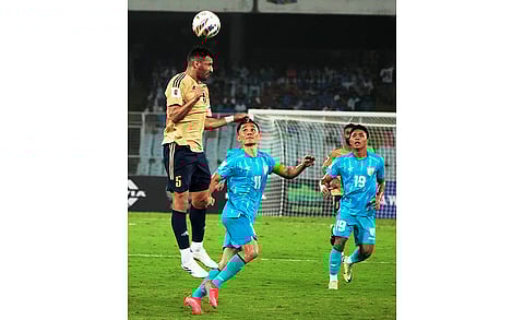 Sunil Chhetri and Edmund Lalrindika vie for the ball